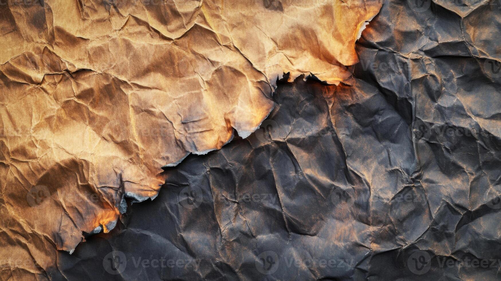 Partially Burned and Crumpled Brown Paper photo