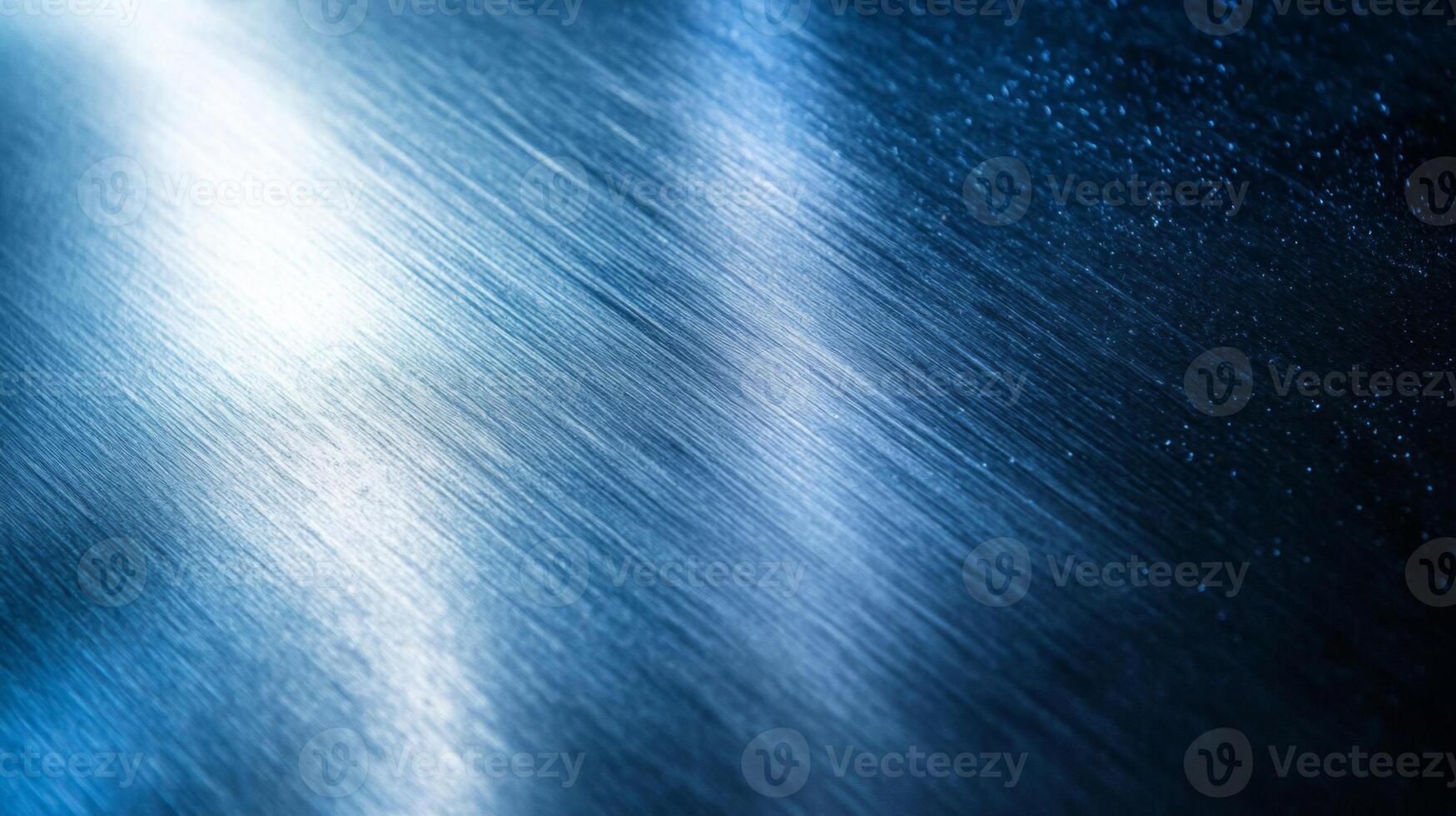Blue Metallic Surface with Diagonal Lines and Light Reflection photo