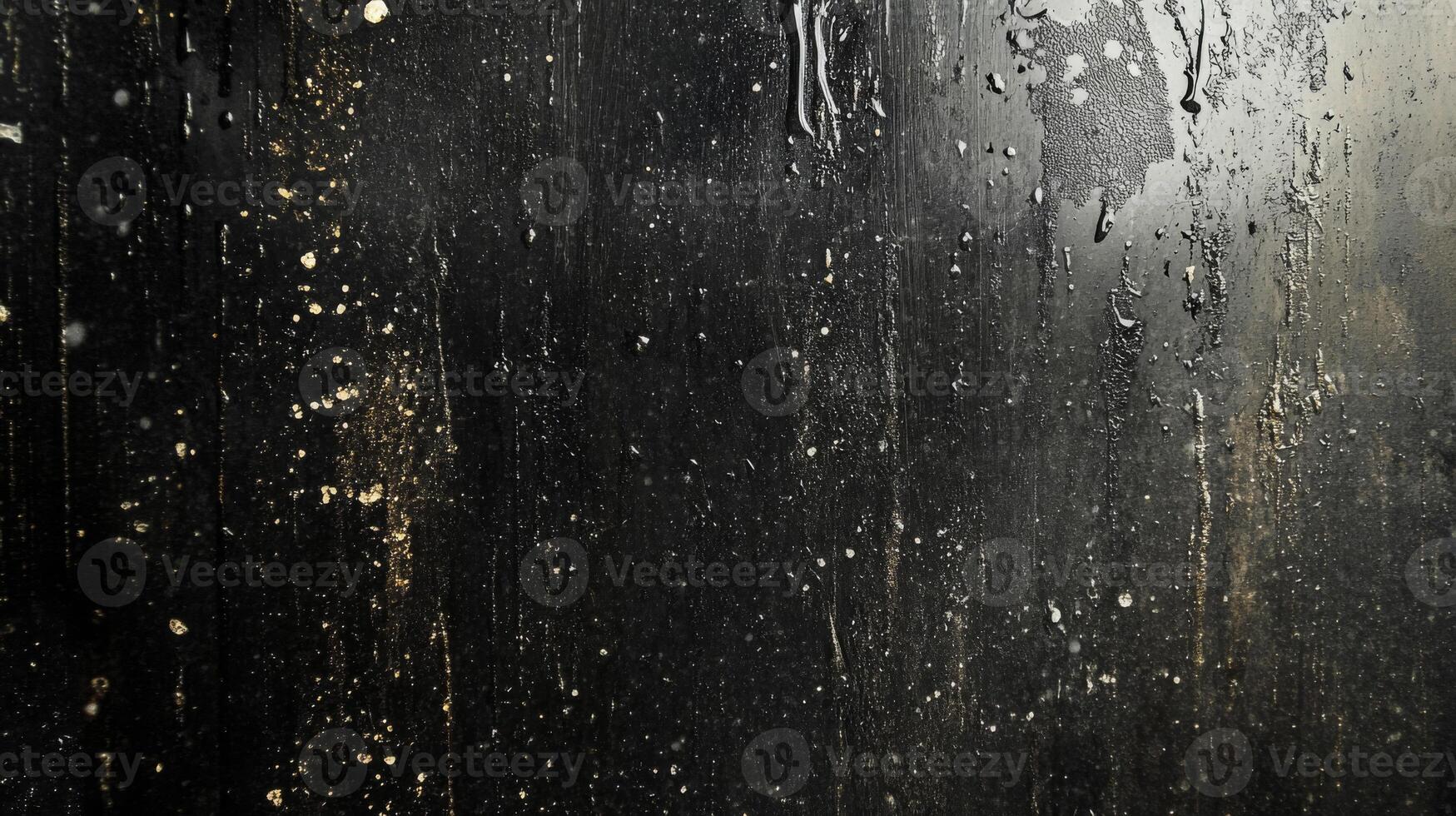 Black Surface with Water Droplets and Gold Flecks photo