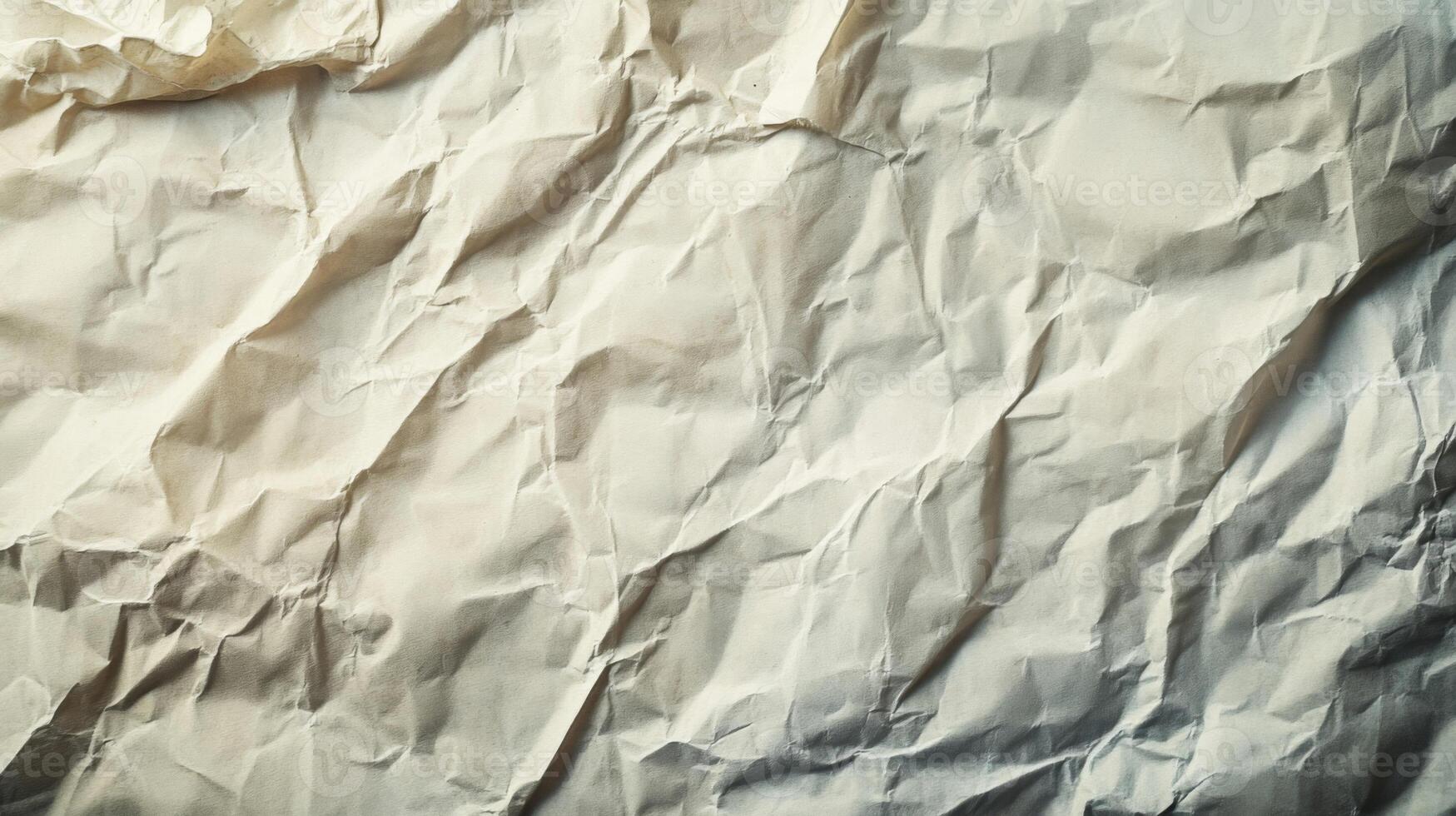 A Close-Up View of a Crumpled Beige Paper Sheet photo