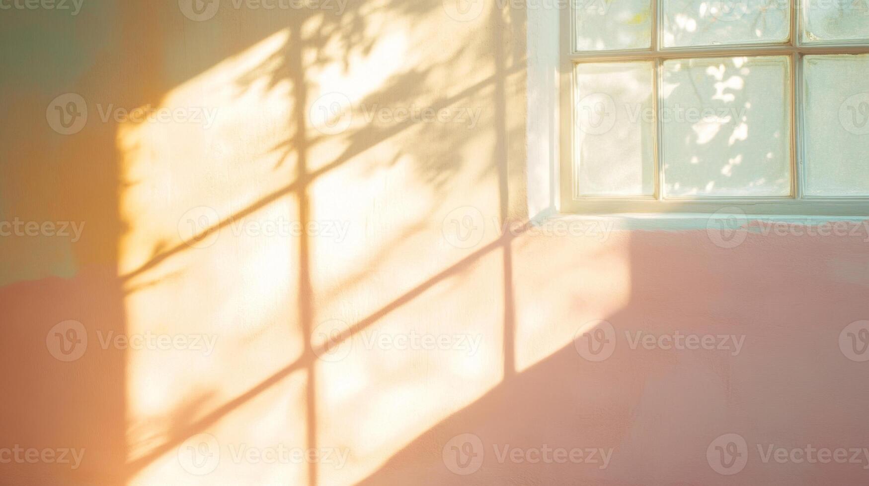Sunlight Streaming Through a Window Casting Shadow Patterns on a Wall photo