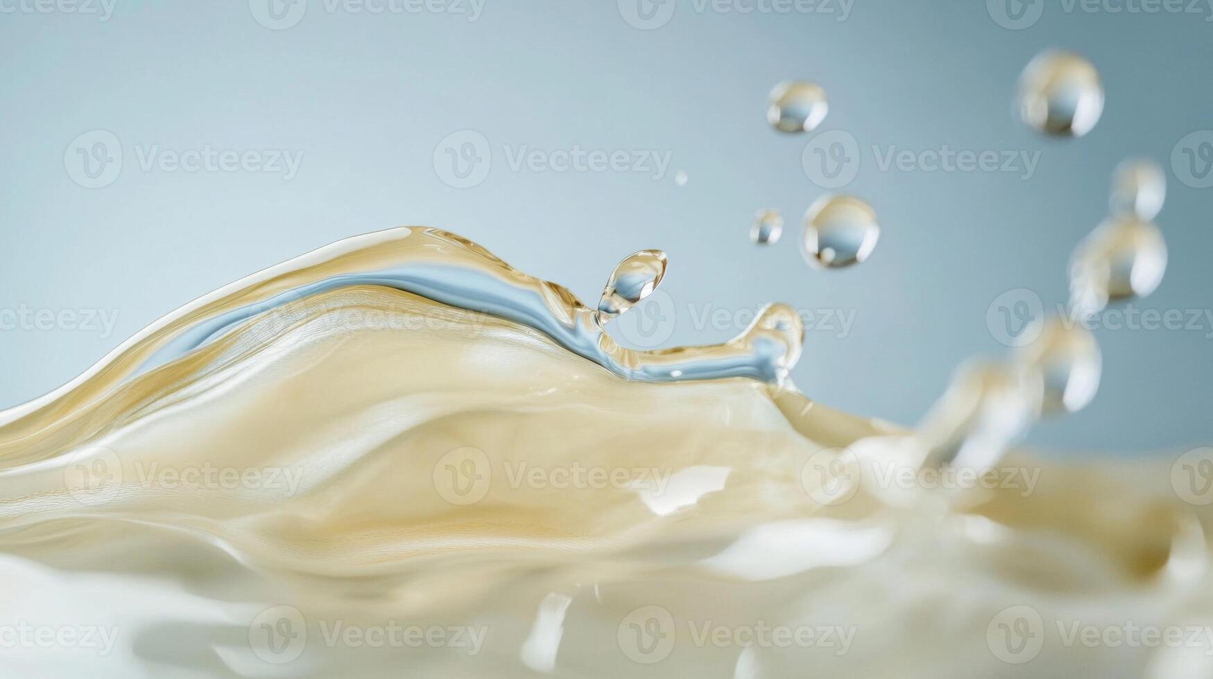 Close-up of Water Droplets Splashing in a Liquid Surface photo
