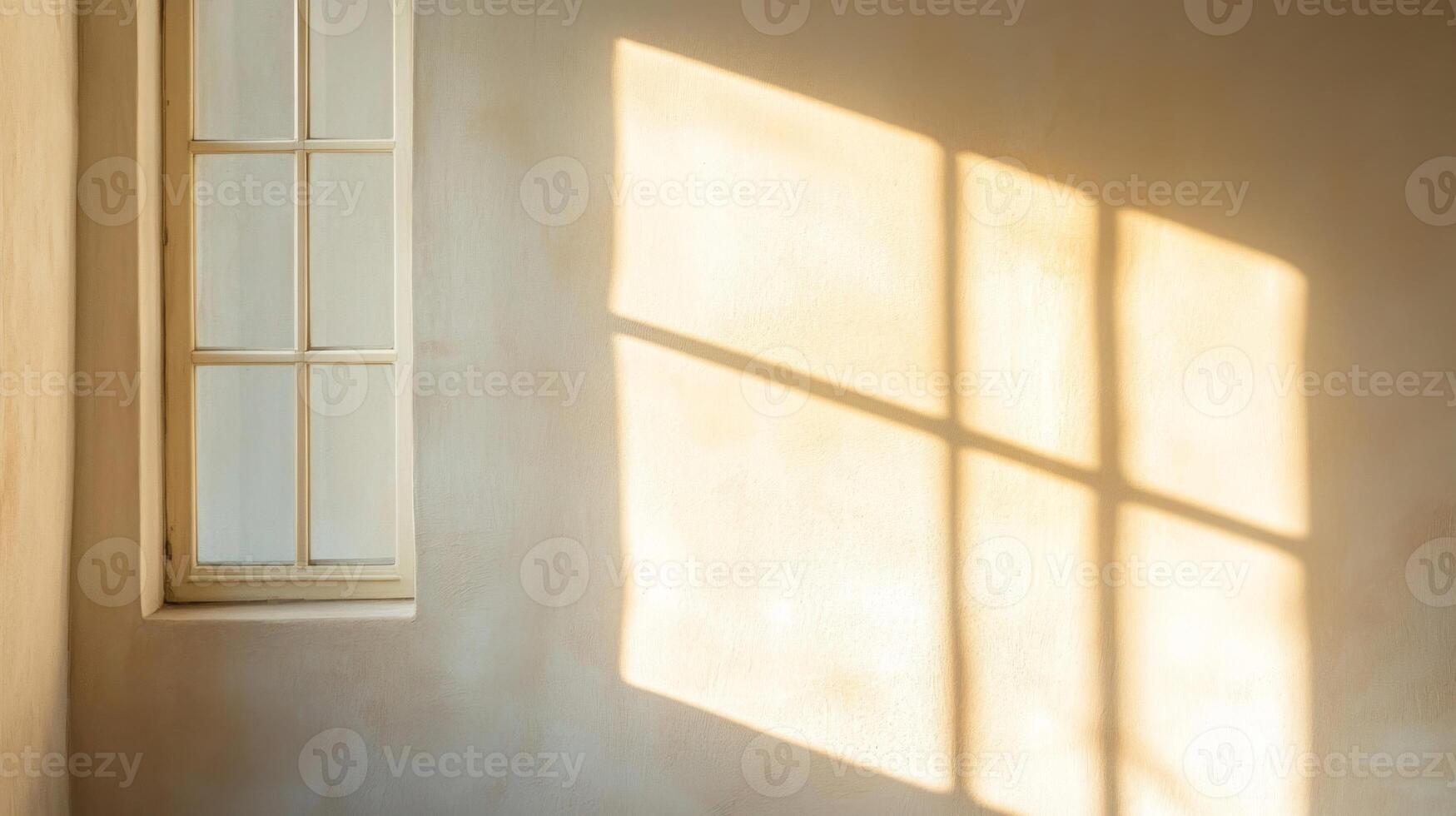Window Shadow Cast On A Beige Wall photo