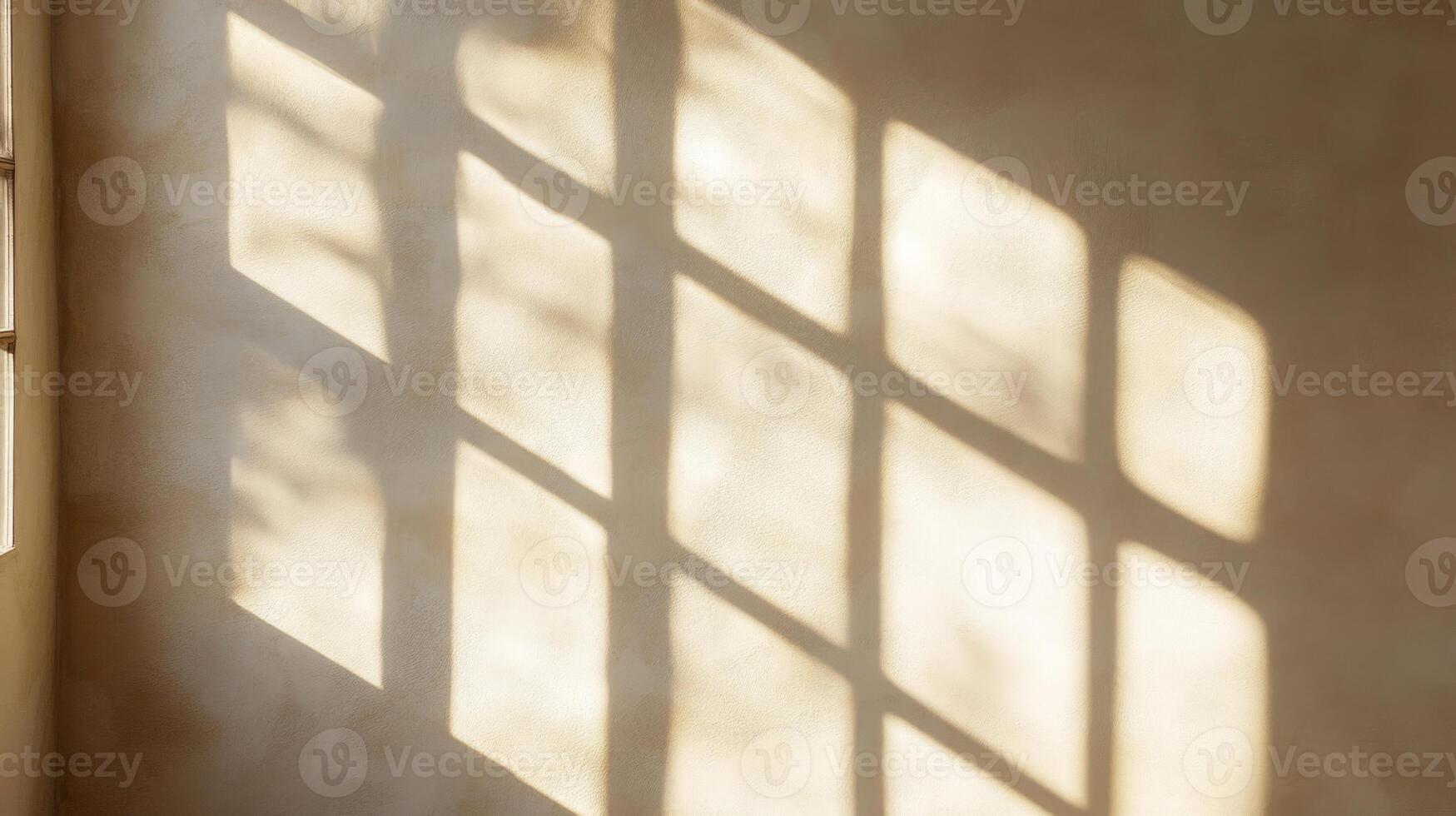 Window Light Casts Geometric Shadows on a Tan Wall photo