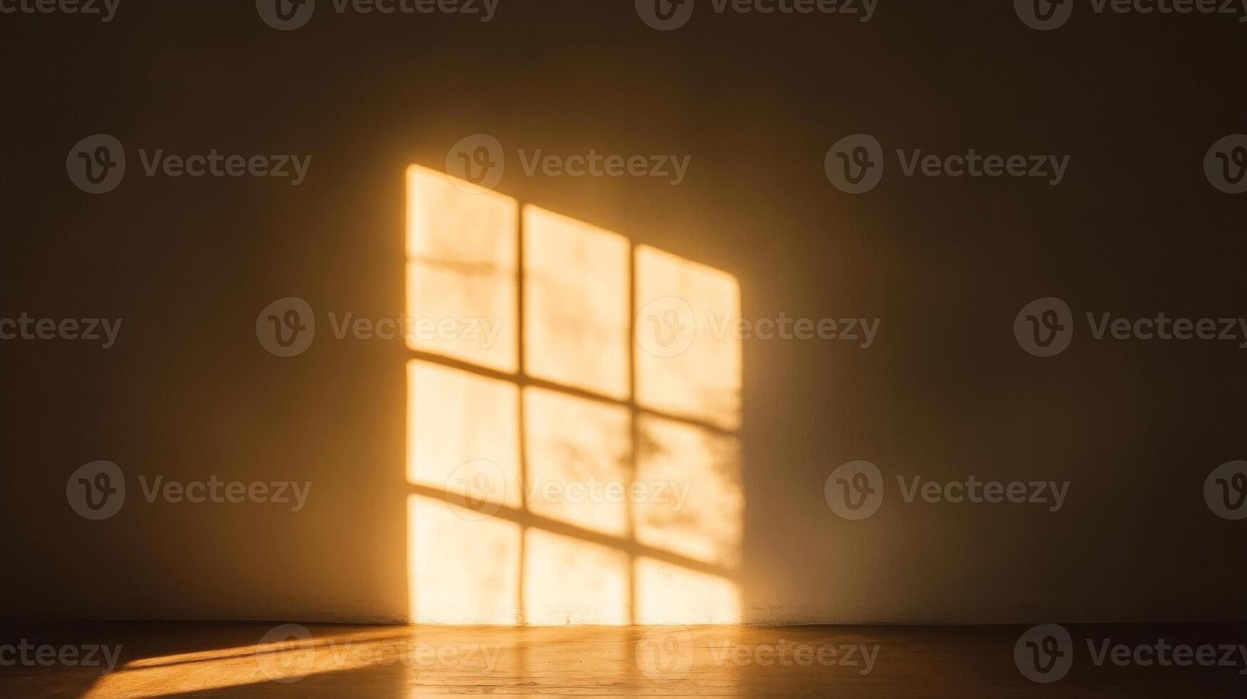 Sunlight Streaming Through a Window Casting a Shadow on a Wall photo