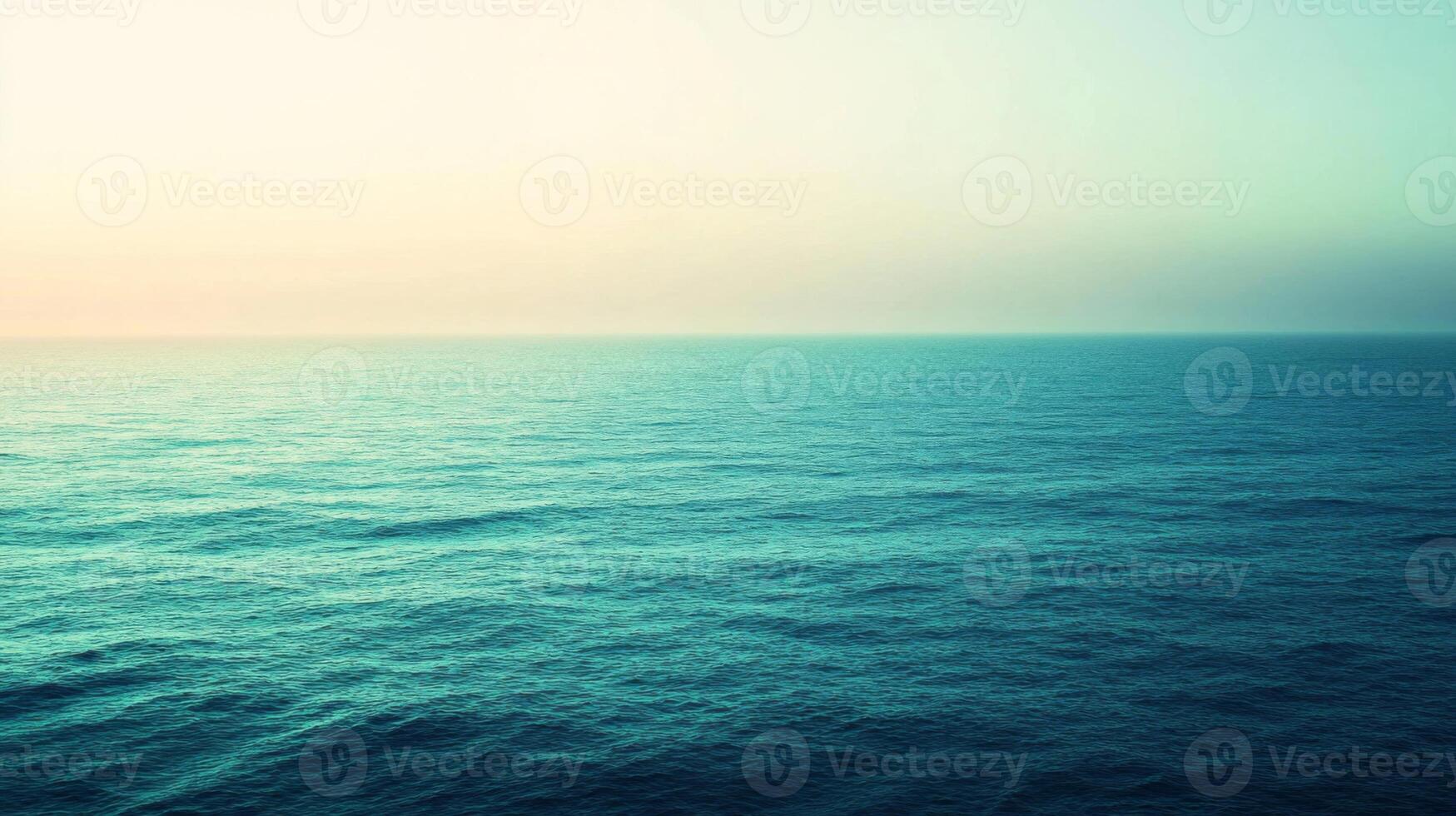 Expansive Ocean Horizon with a Hazy Sky photo