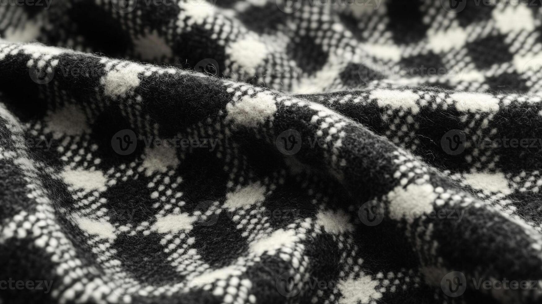Close-up of Black and White Checkered Fabric with Soft Texture photo