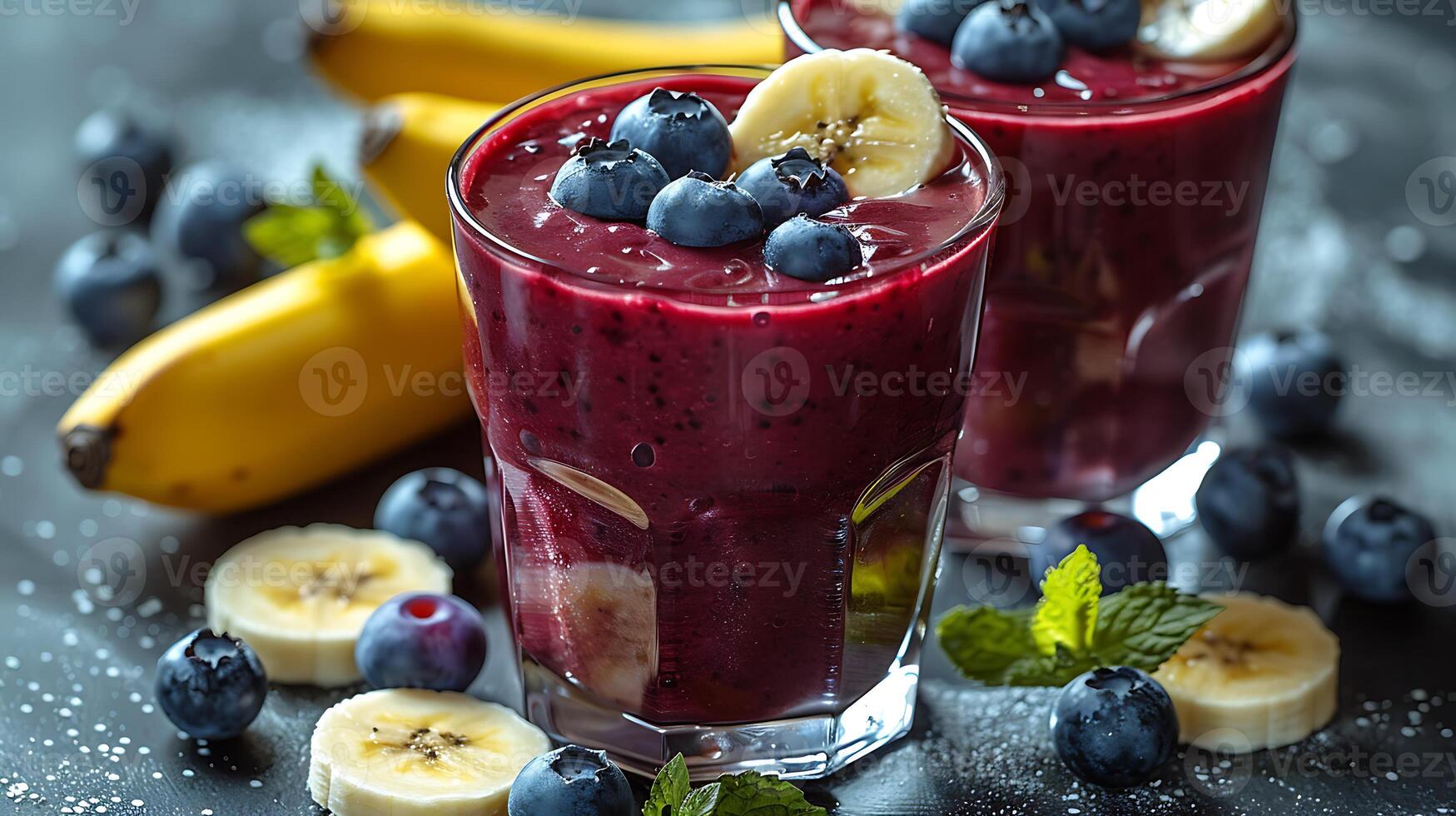 Refreshing BlueberryBanana Smoothie Served a Glass A creamy smoothie made with blueberries and bananas garnished with fruit slices for a delightful touch photo