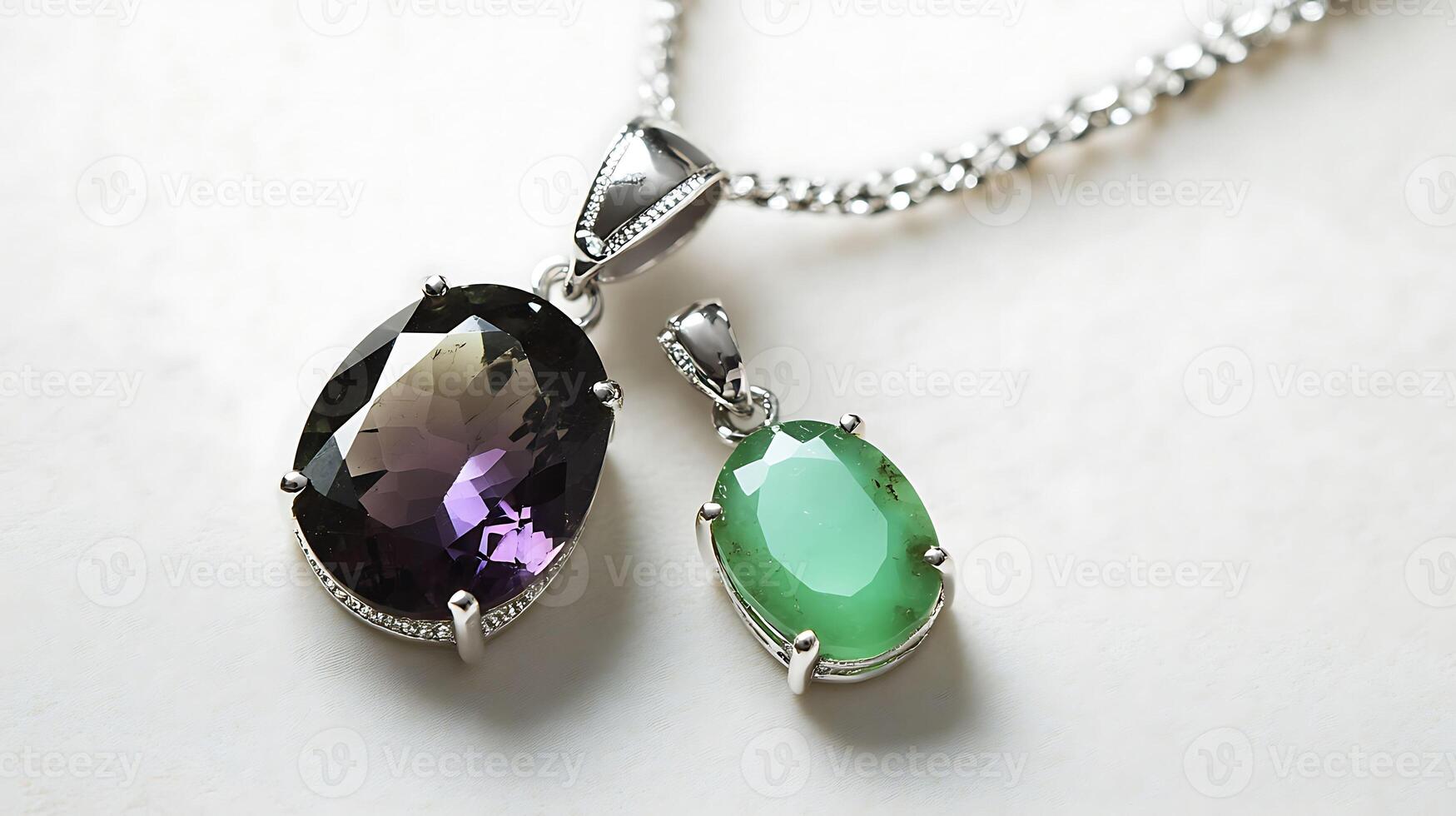 Sophisticated alexandrite and chrysoprase pendant with a colorchanging alexandrite stone and a bright green chrysoprase set in a silver chain photo