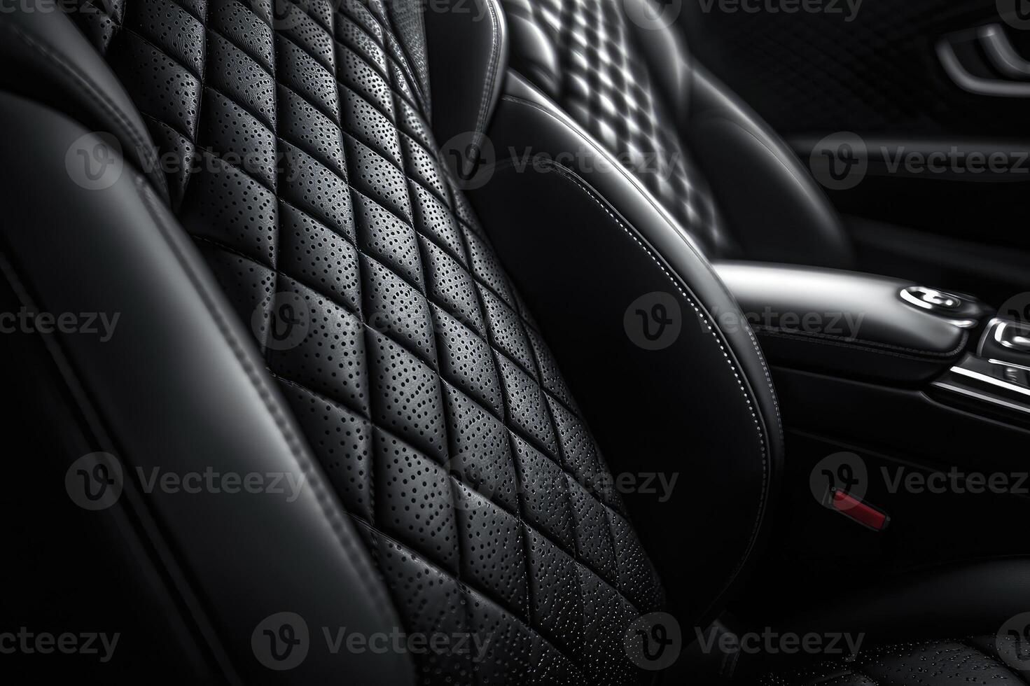 Empty black leather car seat with a diamond pattern stitching photo