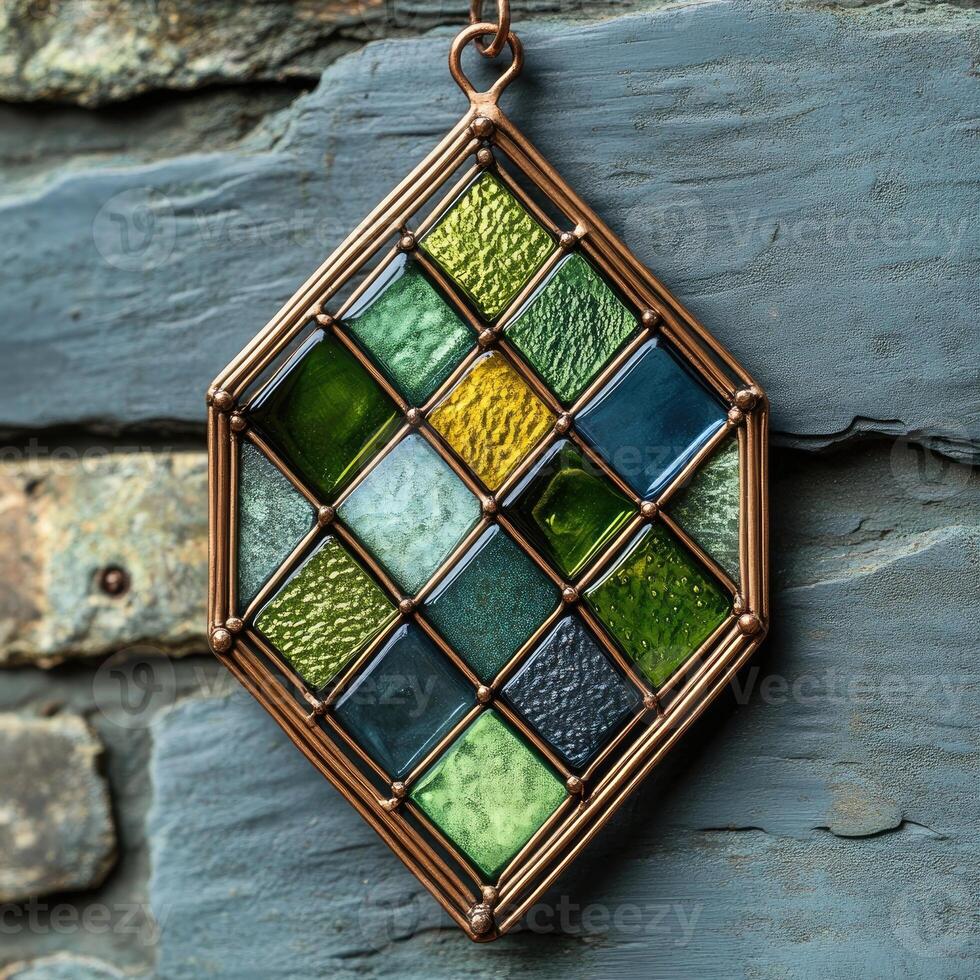 Modern stained glass window displaying geometric green pattern photo