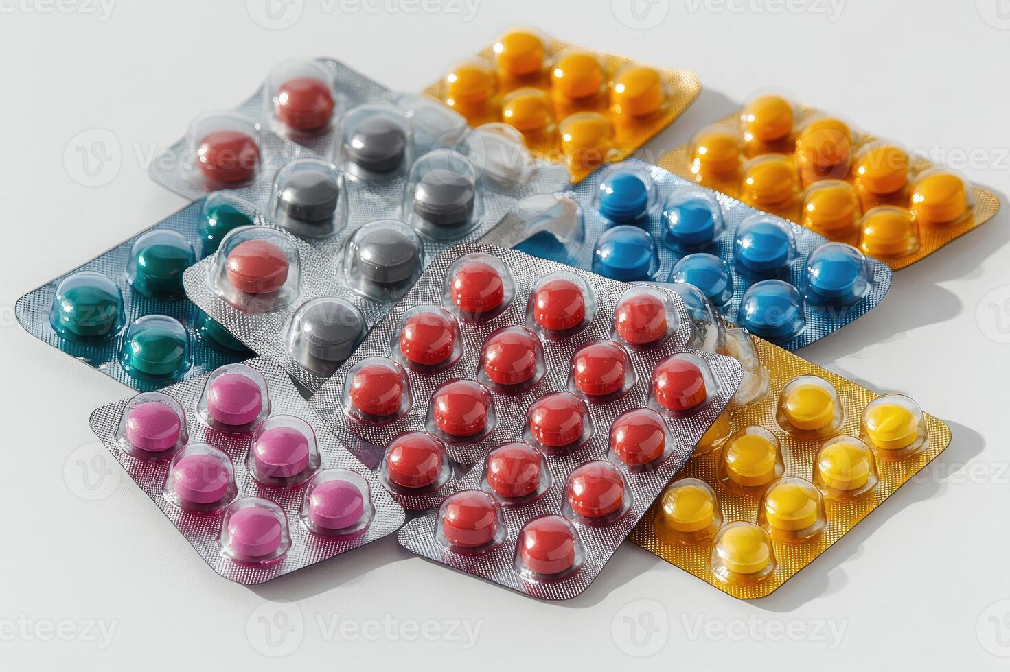 Colorful pills in blisters forming a medicine and pharmaceutical background photo