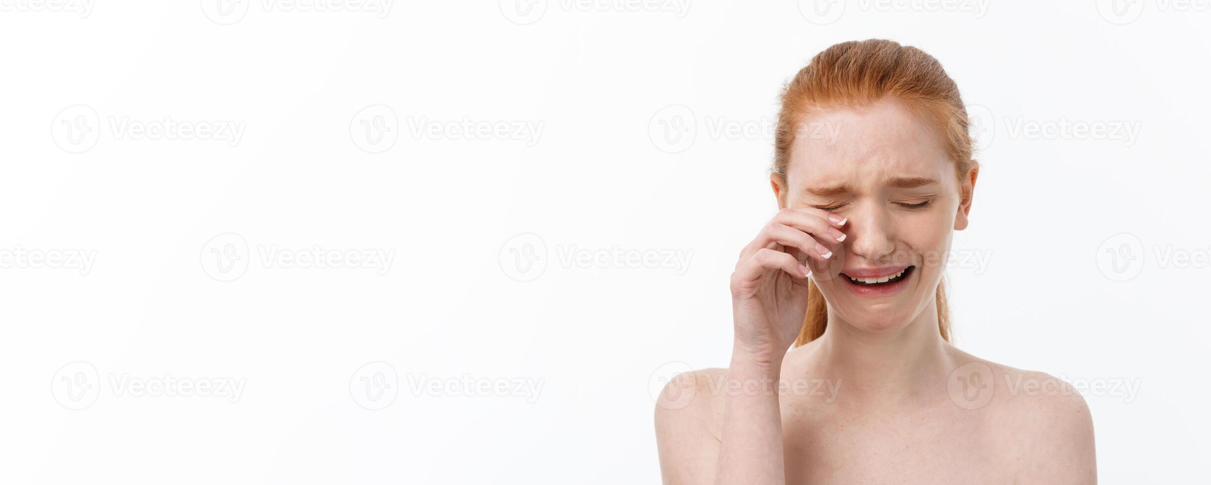 Portrait sad serious young woman with disappointed facial expression.. isolated on white background, looking at camera photo
