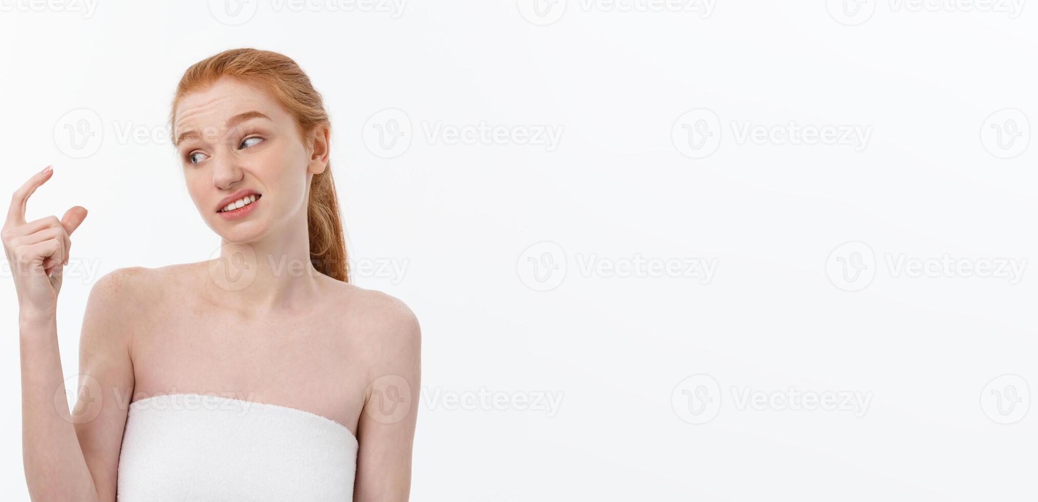 Portrait sad serious young woman with disappointed facial expression.. isolated on white background, looking at camera photo