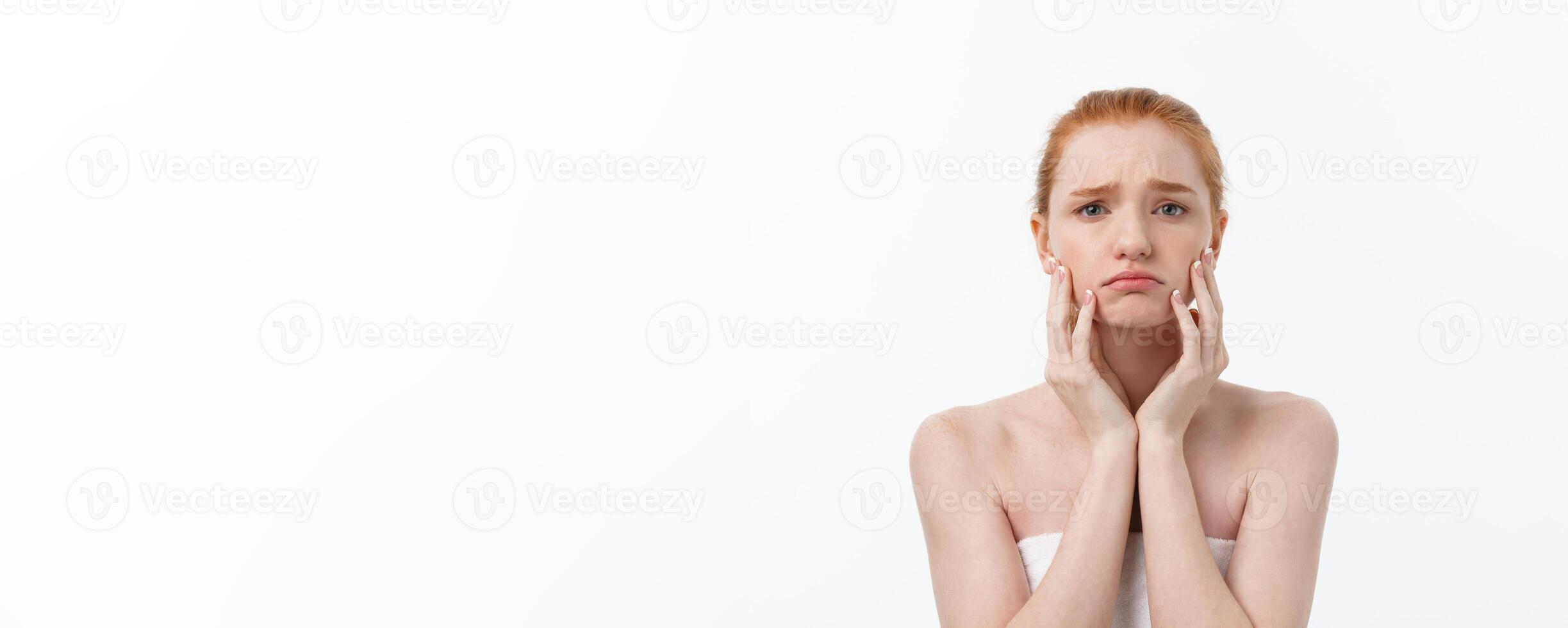 Portrait sad serious young woman with disappointed facial expression.. isolated on white background, looking at camera photo