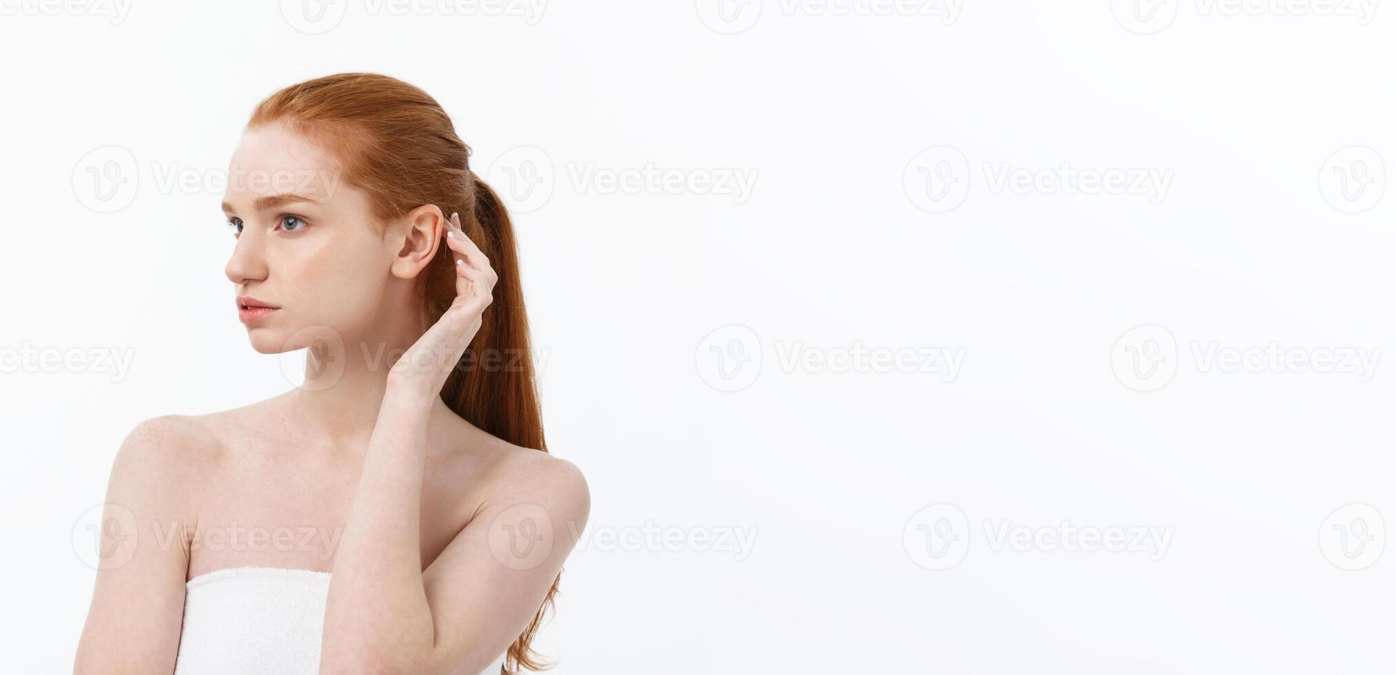 Beauty Woman. Beautiful Young Female touching Her Skin. Portrait isolated on White Background. Healthcare. Perfect Skin. Beauty Face photo