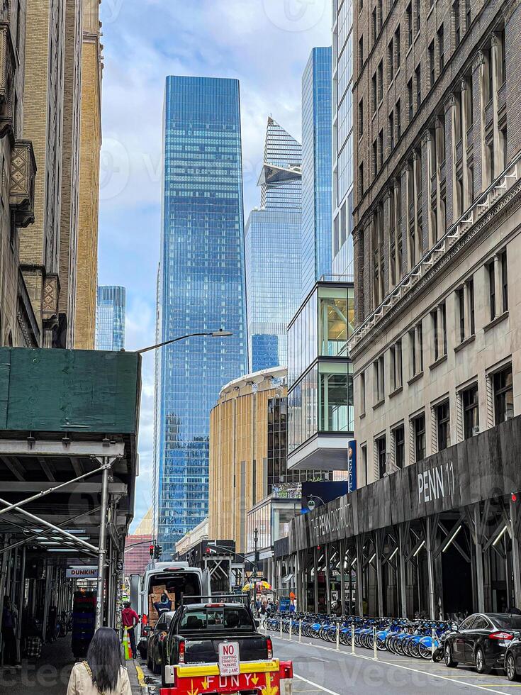 The edge in the background is a tall skyscraper in New York city. photo
