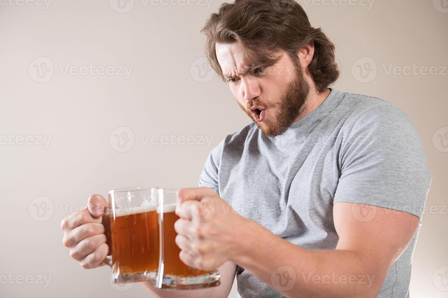 Celebration oktoberfest festival. Beard man drinking beer from mug. Young man tasting draft beer. Lager and dark ale. Beer time. Bearded man holds beer glass. Handsome man drinks ale at bar or pub photo