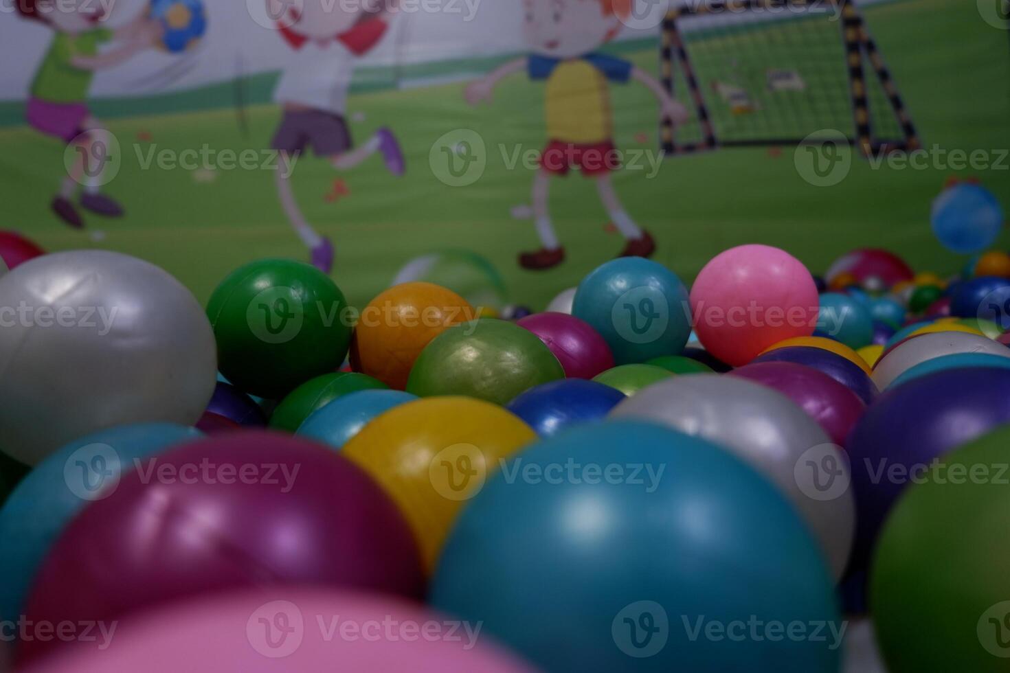 Modern kid's playground with slide and balls indoor photo