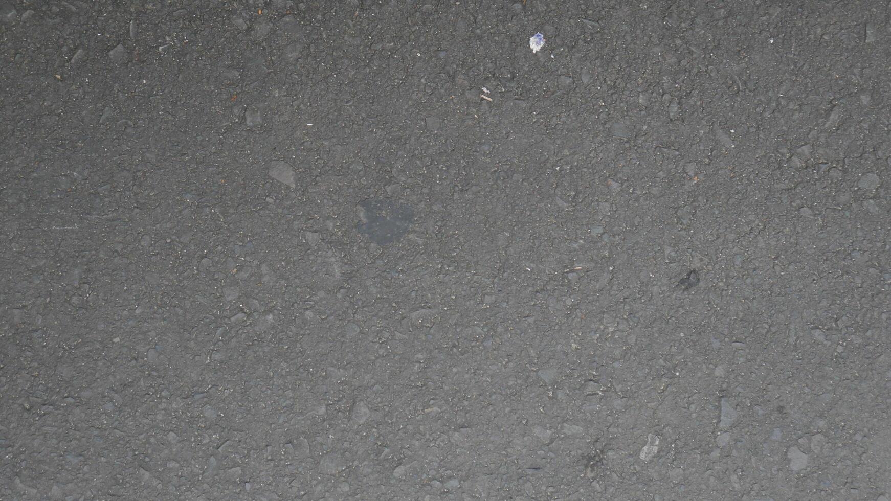Concrete grey wall texture may used as background photo