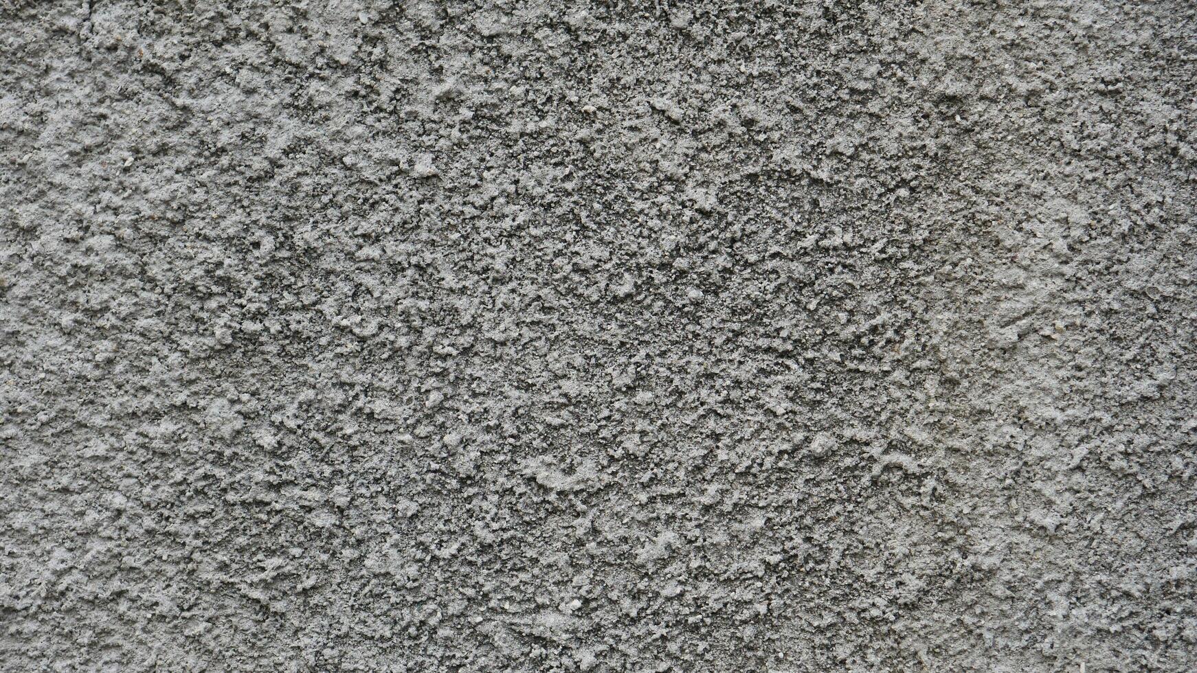 Concrete grey wall texture may used as background photo