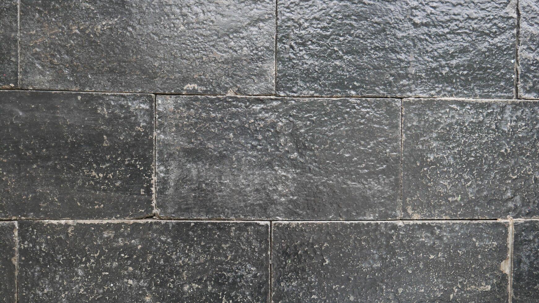 Grey rock stone texture background wall pattern, top view. Background design for dark wallpaper. photo