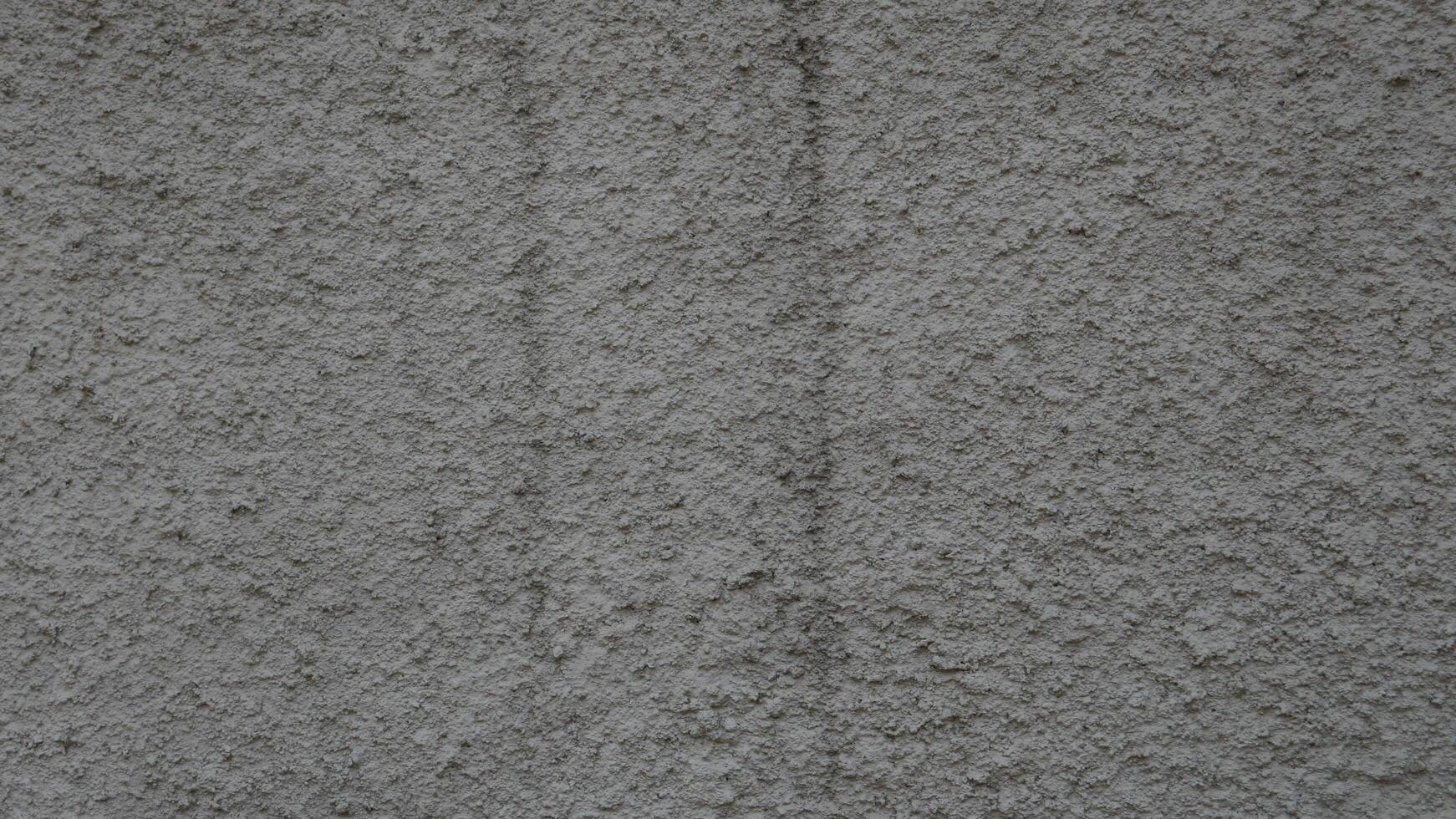 Concrete grey wall texture may used as background photo