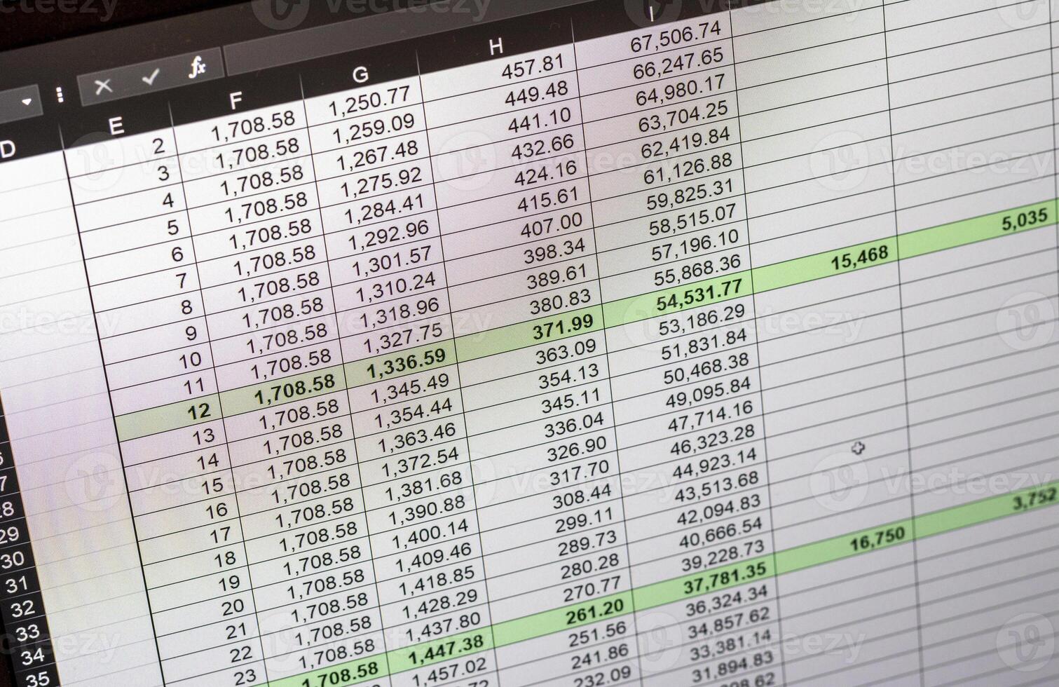 Shot of an dark mode excel sheet on computer screen showing bank loan amortization table. Banking photo