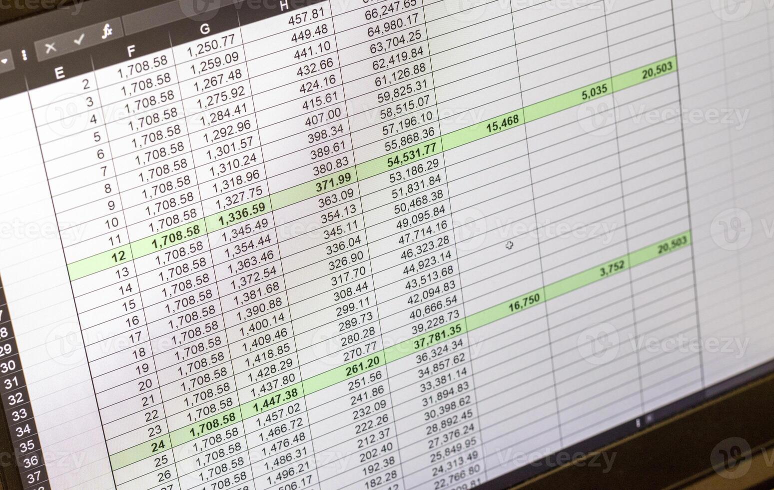 Shot of an dark mode excel sheet on computer screen showing bank loan amortization table. Banking photo