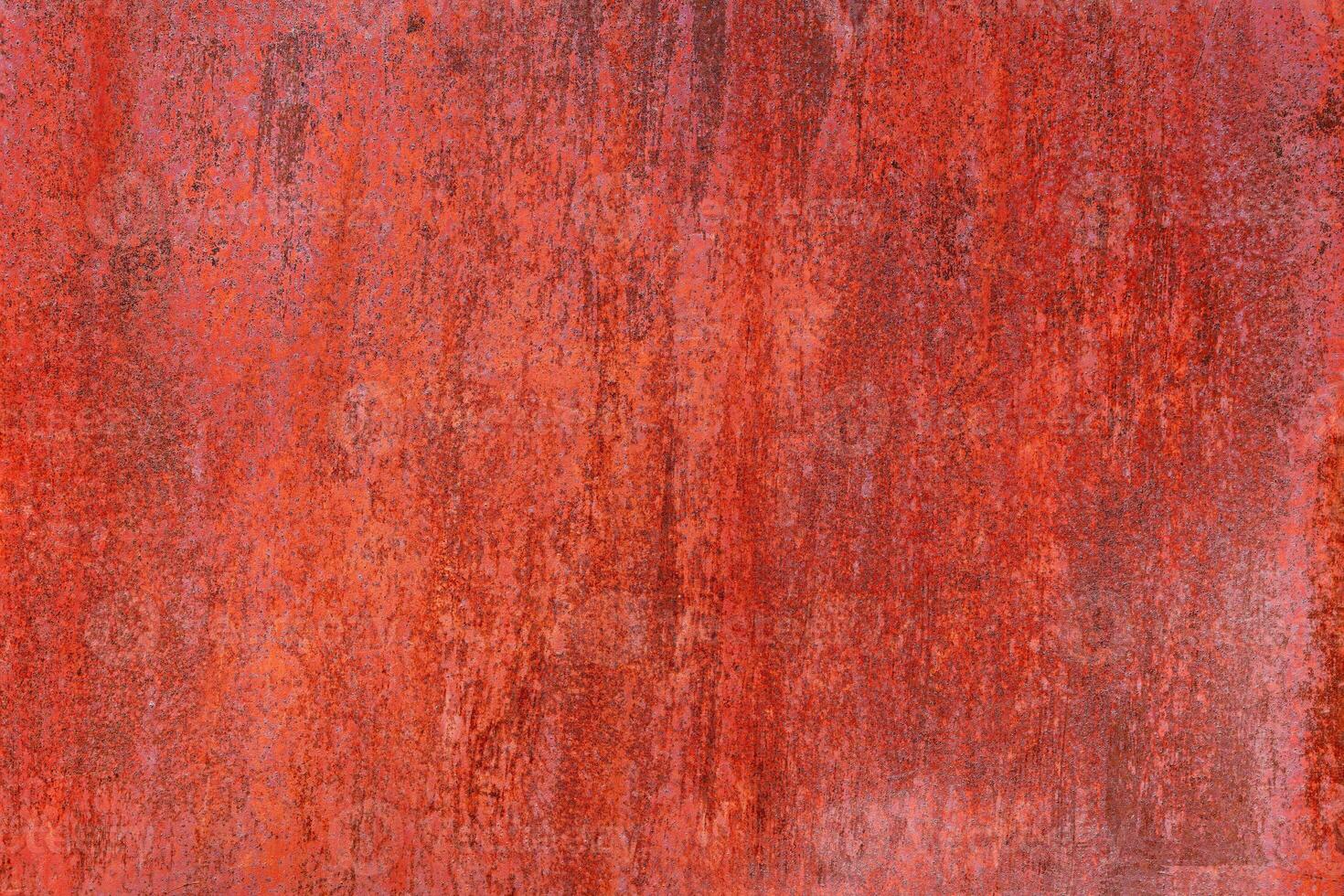 rusty red painted flat sheet metal surface full-frame background and texture photo