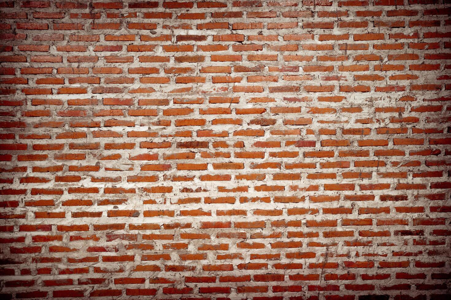 old brown brick wall background. Wallpaper wall, sandstone wall for wallpaper, Old grunge brick wall pattern or texture. photo