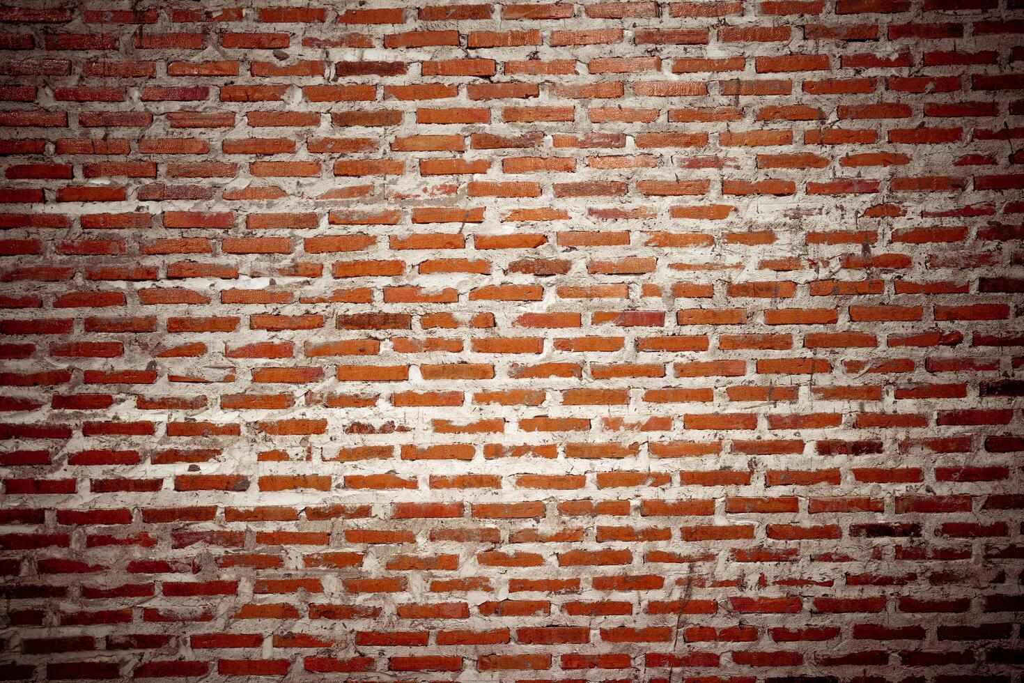 old brown brick wall background. Wallpaper wall, sandstone wall for wallpaper, Old grunge brick wall pattern or texture. photo