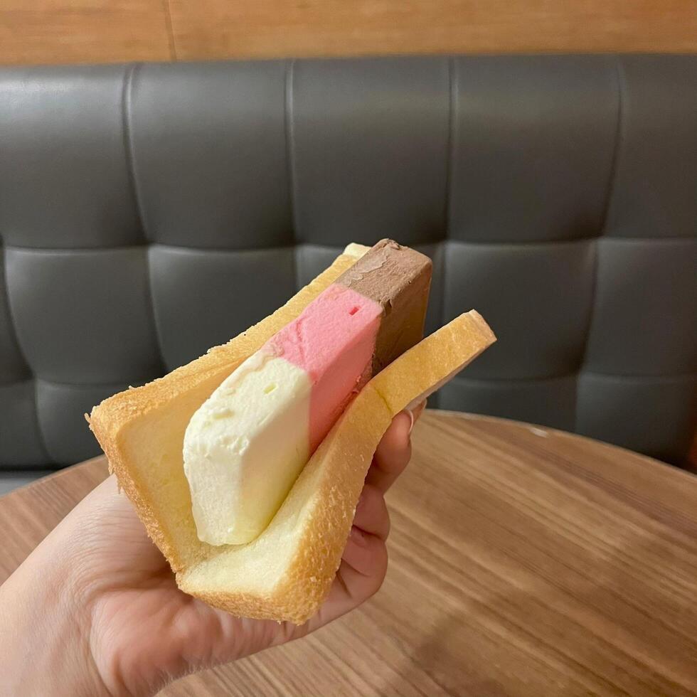 Chilling with Singaporean ice cream. A delightful mix of flavors that is as vibrant as the city itself photo