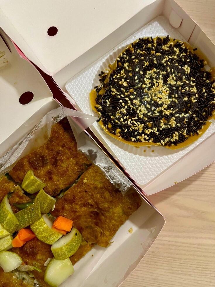 Savoring the best of both worlds with Indonesian thick folded crepe that is sweet and savory photo