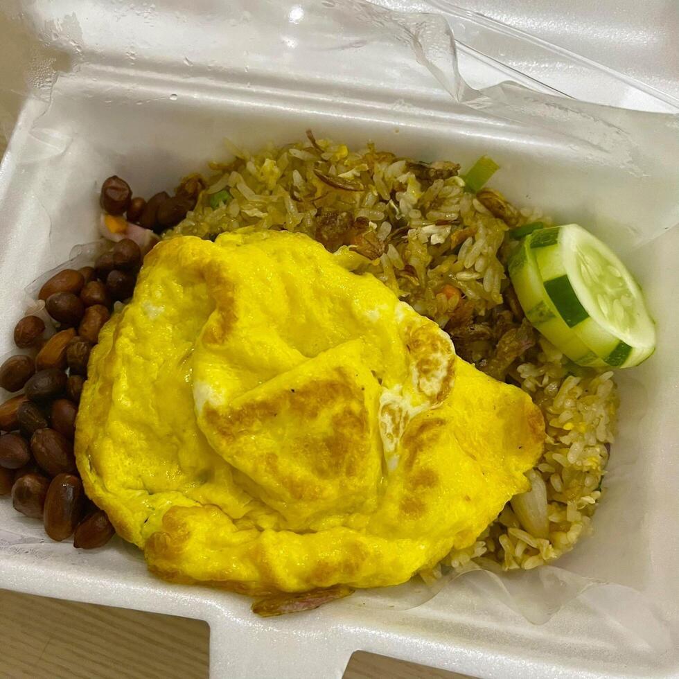 Diving into the bold flavors of Indonesia fried rice, Nasi Goreng Aceh. A spicy twist that is simply irresistible photo