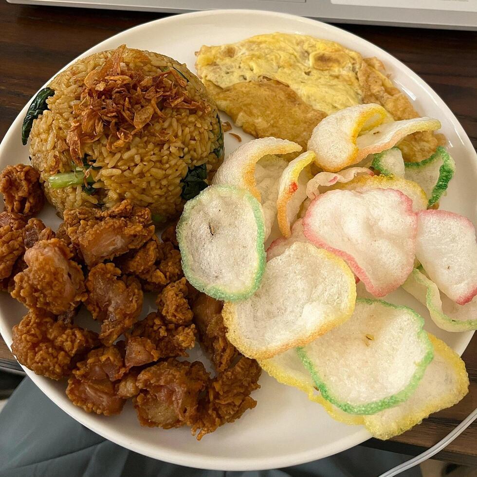 Savoring every bite of this delicious Indonesian fried rice photo