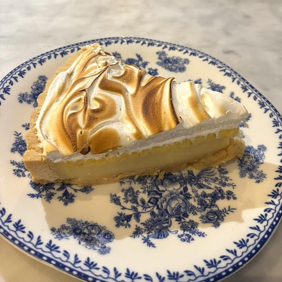 This lemon pie is a slice of sunshine on a plate photo