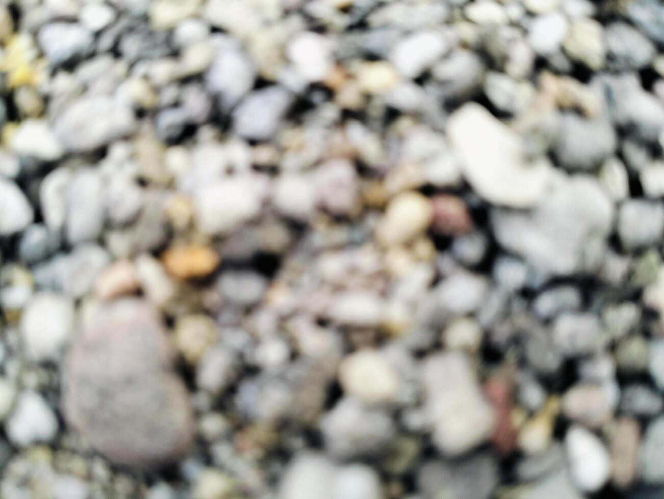 Close up of pebbles and rocks with blurry background, Natural stones background, wallpaper out of focus. photo