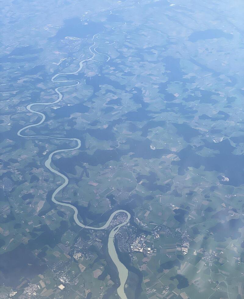 An aerial view of Croatia from an aeroplane showing a winding road photo