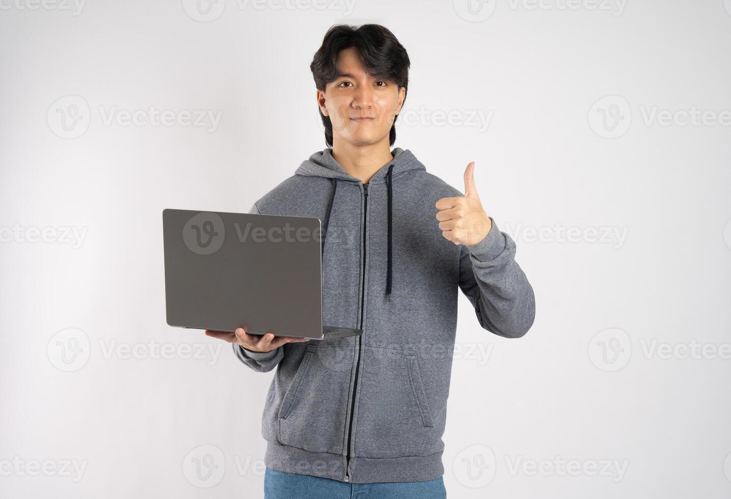 Portrait of asian man wearing hoodie posing on white background photo