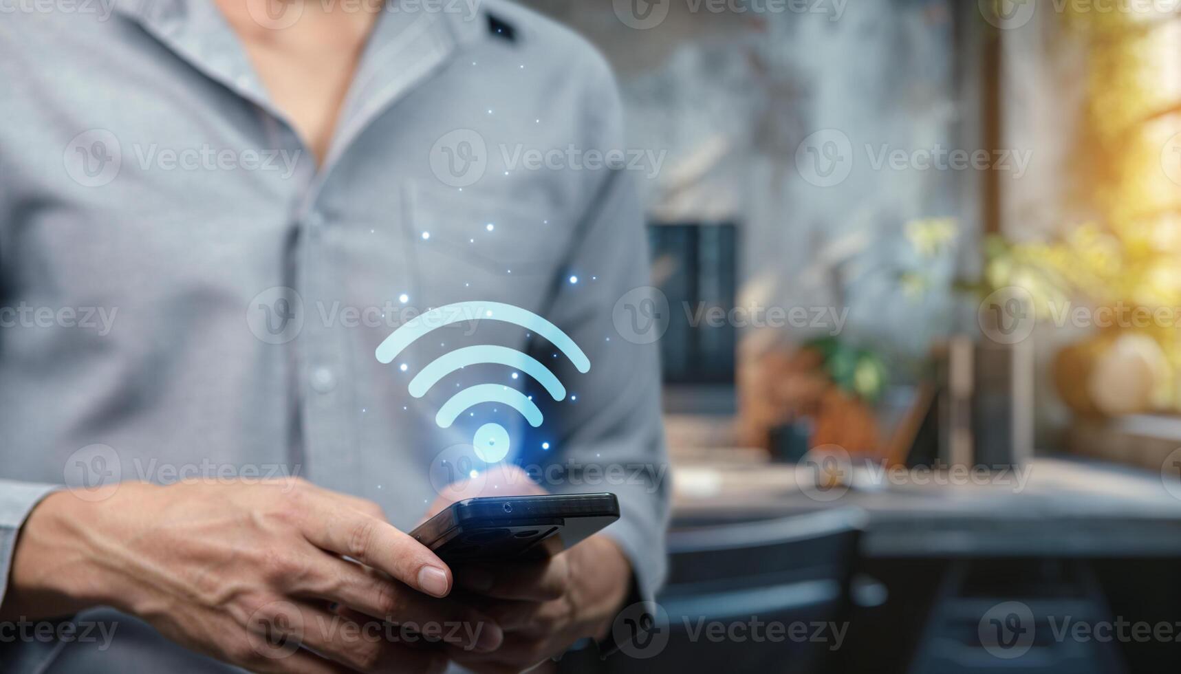 Wireless Signal Icon with Smartphone in Modern Office photo
