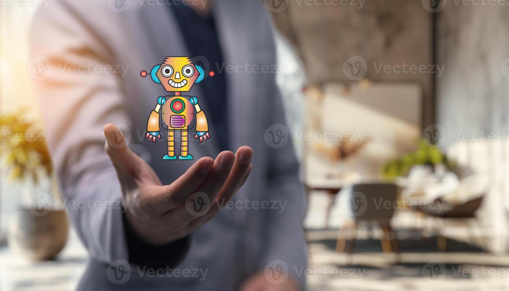 A person in a suit holding a robot in their hand photo