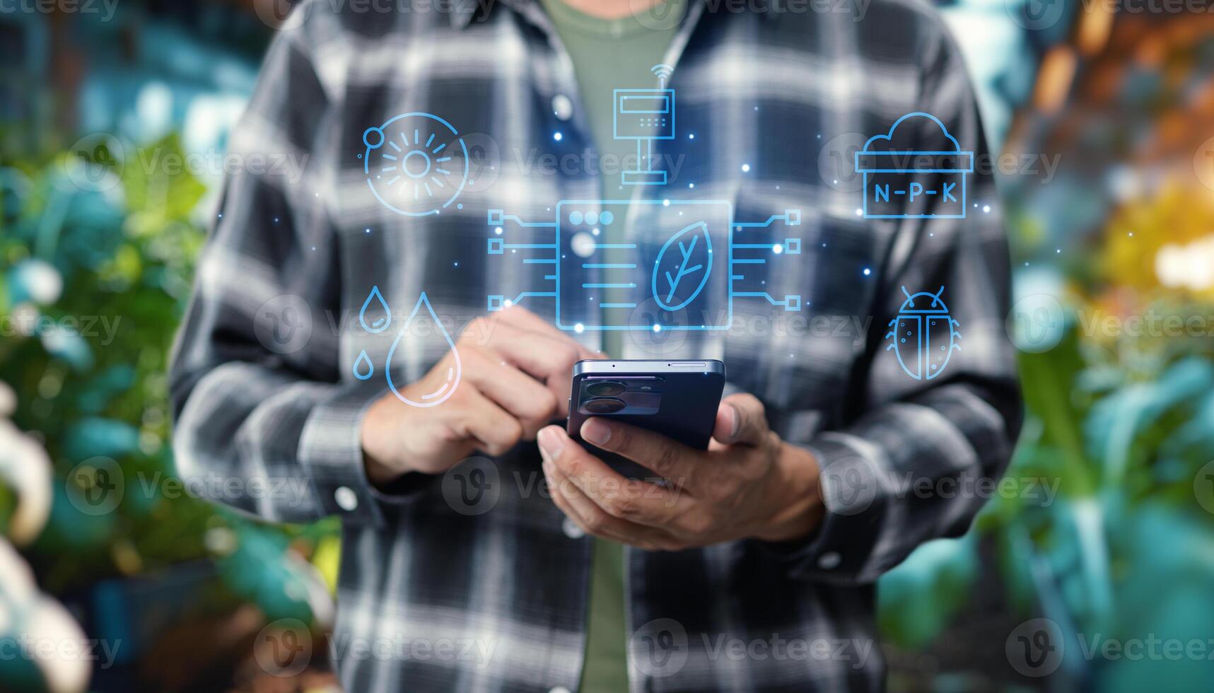 Man using smartphone with digital icons on background photo