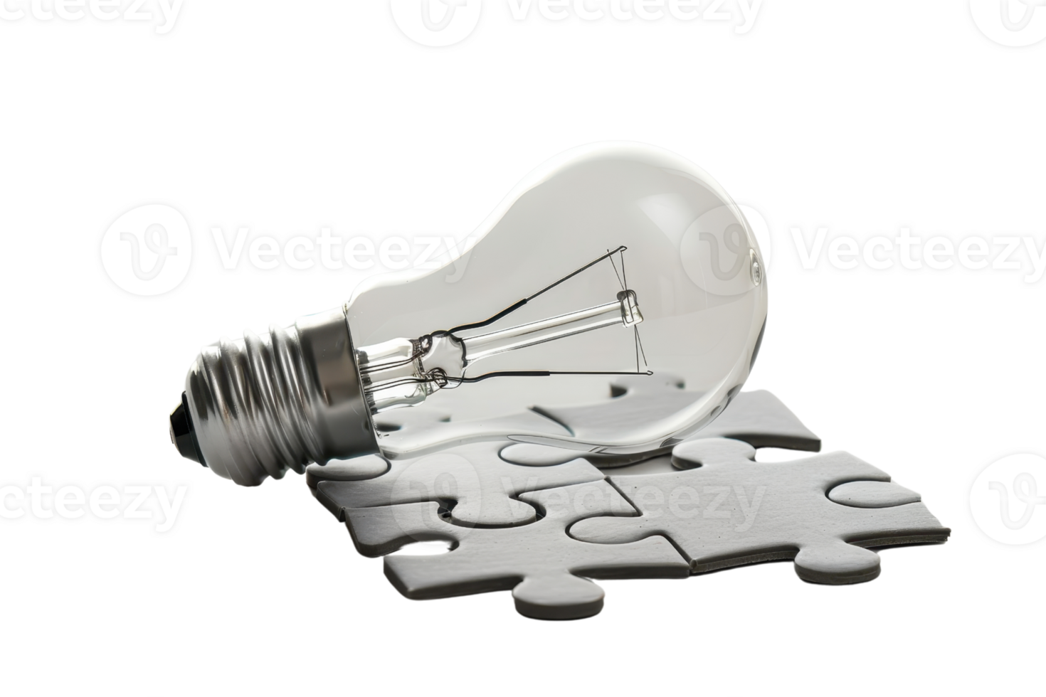Concept image of a light bulb resting on a jigsaw puzzle, symbolizing ideas, innovation, and problem-solving. png