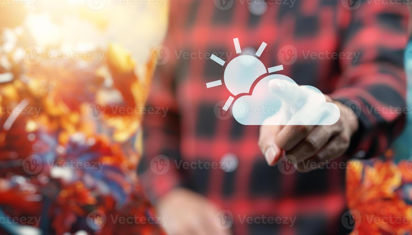 A person is holding a cloud with a sun and a cloud photo
