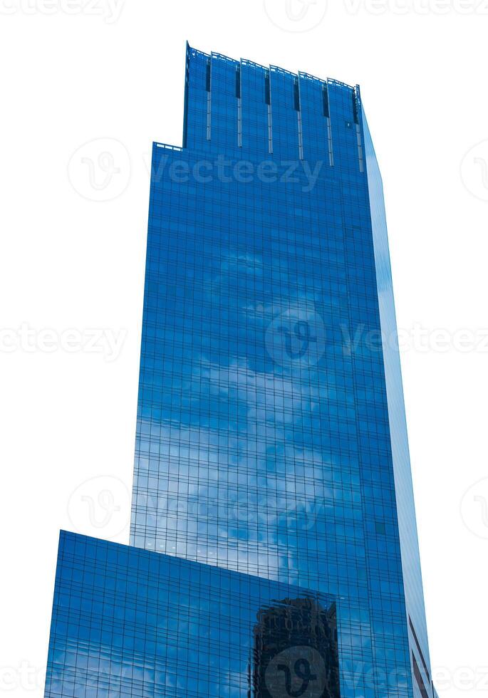 A tall building with a blue sky and clouds photo