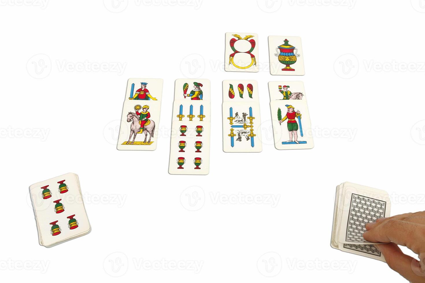 A person is playing a game of dominoes photo