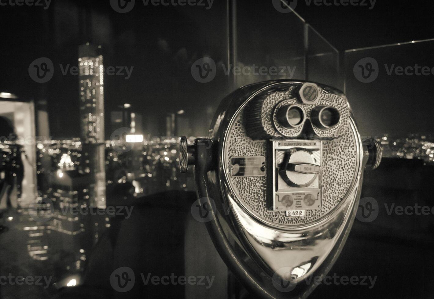 A black and white photo of a coin