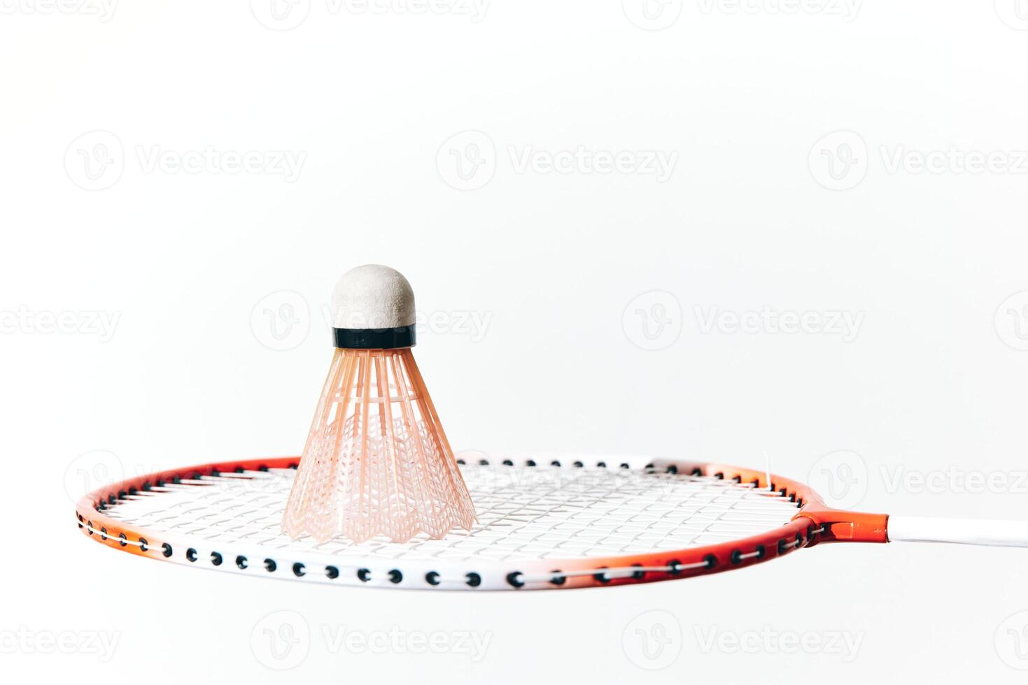 Badminton racket and shuttlecock isolated on white background. 3d illustration of sports equipment photo