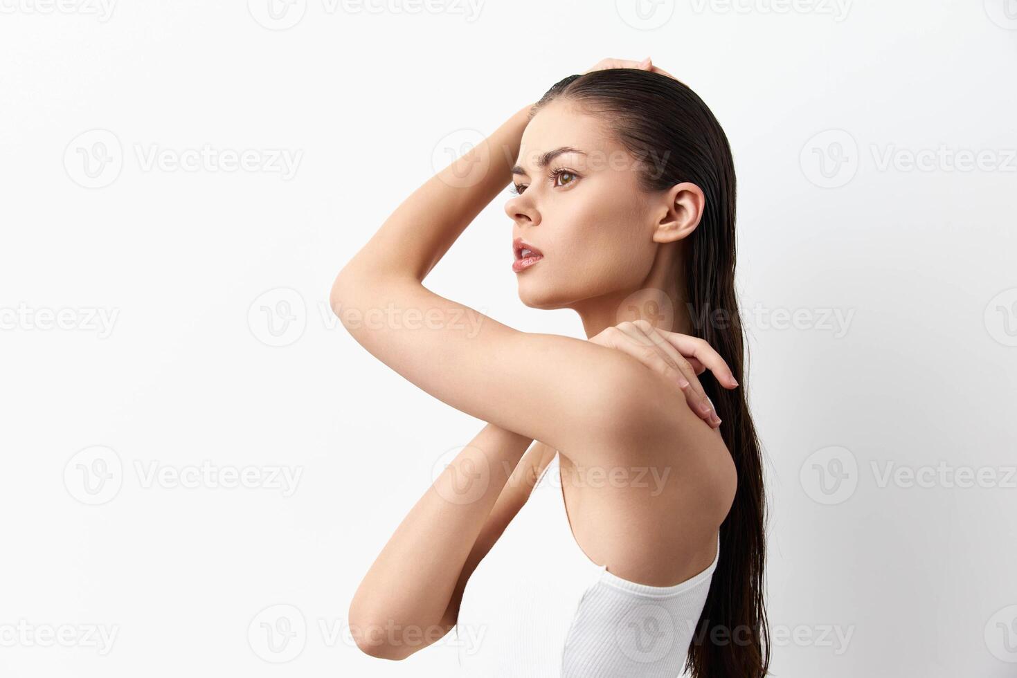 This image captures a young woman s profile, highlighting her long, flowing hair and graceful photo